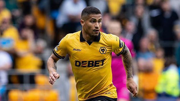 Aston Villa sign Joao Gomes from Wolves for £38m